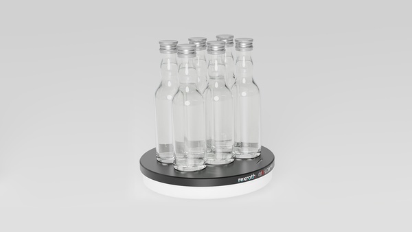 Werkstückträger des berührungslosen Planarsystems ctrlX FLOW6D, auf dem Glasflaschen stehen