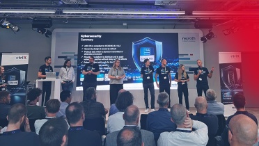 The picture shows the speakers of the Cybersecurity Day on stage during the Q&A session.