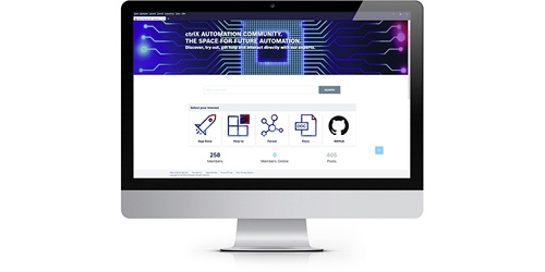 Zdjęcie monitora komputera przedstawiające stronę główną społeczności ctrlX AUTOMATION.