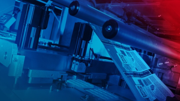 Horizontal flow wrapper for chocolate packaging