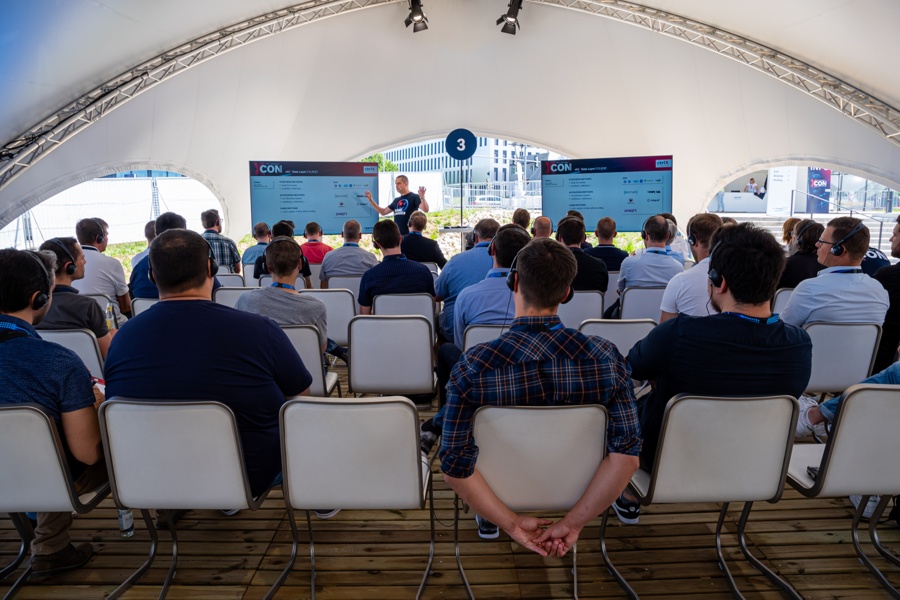 In break-out sessions under the tents, developers explain their area of expertise
