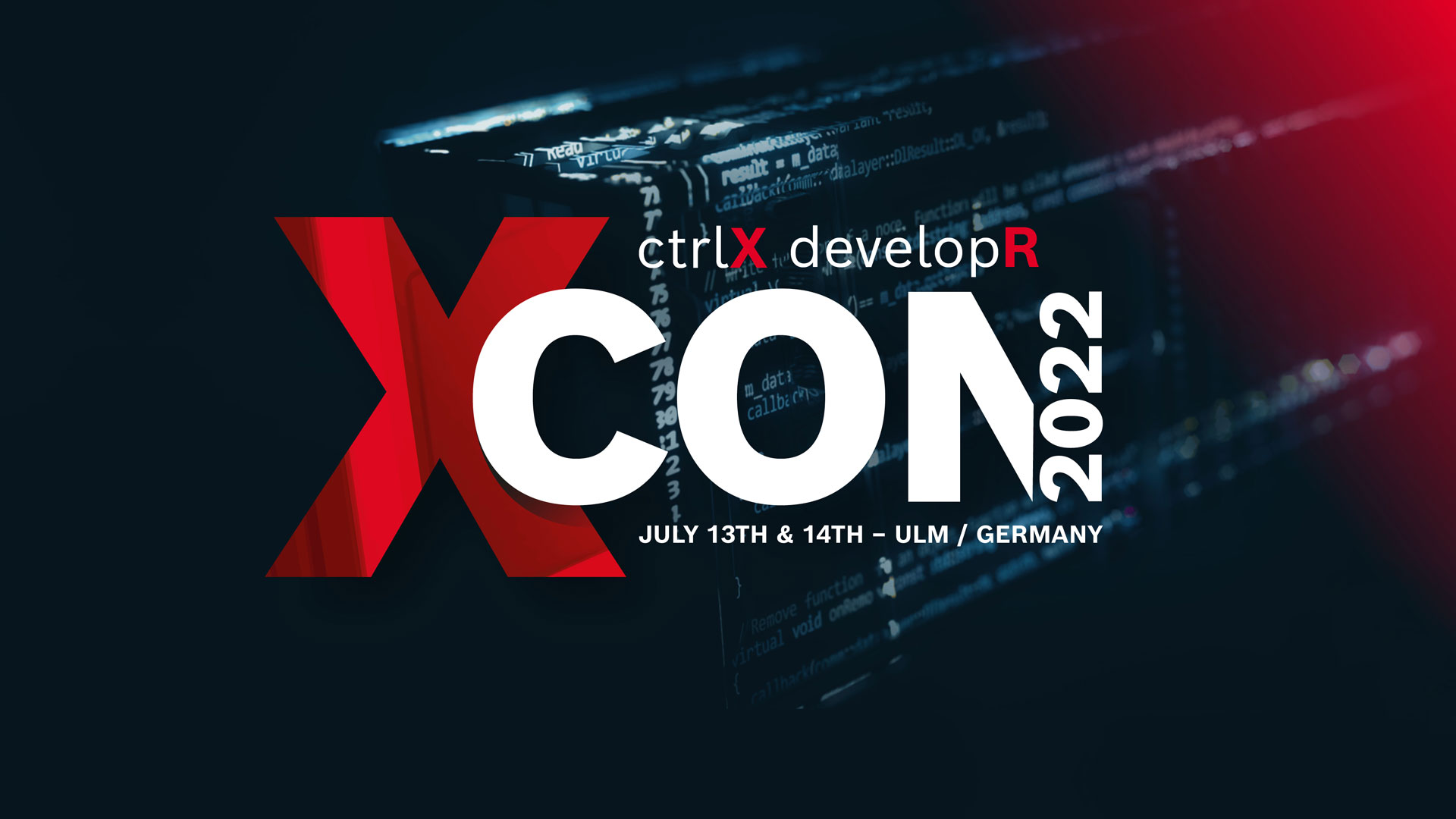 Napis na konferencji ctrlX developR (XCON 2022). W tle widoczny jest kontroler przemysłowy ctrlX CORE.